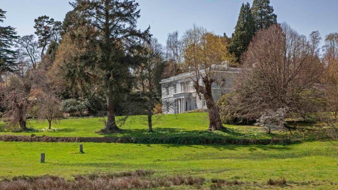 The exterior of the house at Parke surrounded by the gardens in spring
